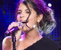 NikkiYanofskywithmicrophoneimage.jpg
