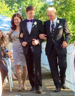 Walking Aidan down the aisle.jpg